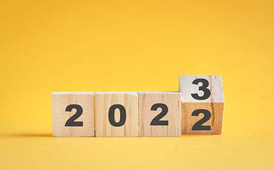 Wooden blocks showing 2022 turning to 2023