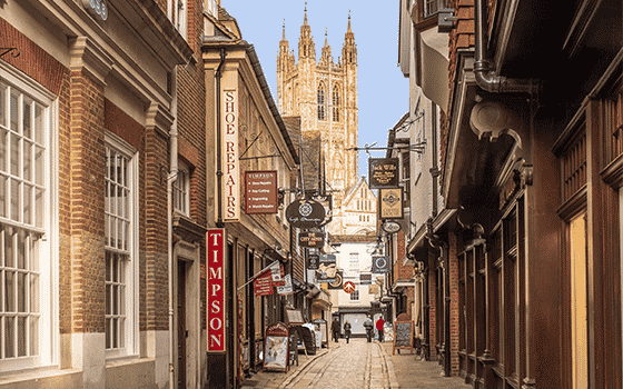 the streets of Canterbury with Canterbury Cathedral in the distance