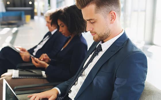 Business recruitment - employees in suits in a waiting area