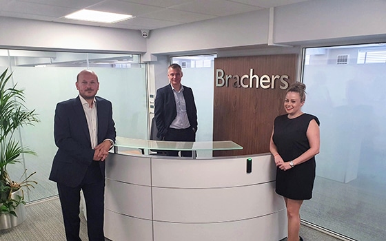 Partners Lee May, James Bullock and Alexandra Gordon in the reception of Brachers' Canterbury office