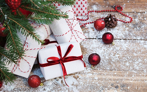 Christmas gifts under a tree