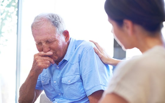 Fatal accident - young woman showing sympathy for older man